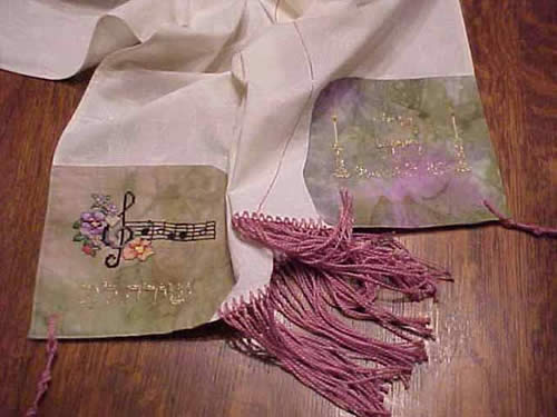pink shawl with music motif
